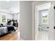View from a bedroom to an attached bathroom with plantation shutters for natural light at 3741 Juneberry Ct, Mount Pleasant, SC 29466