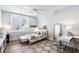 Bright bedroom with a large window, a bed with floral bedding and a ceiling fan at 3741 Juneberry Ct, Mount Pleasant, SC 29466