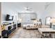 Bright bedroom with a ceiling fan, a desk and a bed with floral bedding at 3741 Juneberry Ct, Mount Pleasant, SC 29466