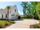 An exterior featuring a three-car garage, long driveway, and basketball hoop near the backyard at 3741 Juneberry Ct, Mount Pleasant, SC 29466