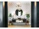 Sophisticated foyer featuring a decorative mirror, console table, and accent lighting at 3741 Juneberry Ct, Mount Pleasant, SC 29466