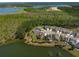 Beautiful aerial view of lakeside homes surrounded by lush green foliage, creating a serene atmosphere at 393 Tupelo Lake Dr, Summerville, SC 29486