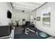 Spacious garage featuring fitness equipment, ample storage, and a well-lit area perfect for workouts at 393 Tupelo Lake Dr, Summerville, SC 29486