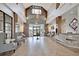 Spacious lobby featuring elegant seating, high ceilings, wood accents, and stylish decor at 393 Tupelo Lake Dr, Summerville, SC 29486
