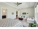 Elegant main bedroom featuring a trey ceiling, white accents, and hardwood flooring at 393 Tupelo Lake Dr, Summerville, SC 29486