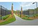Scenic walkway through the community with multiple tennis courts at 393 Tupelo Lake Dr, Summerville, SC 29486