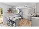 Modern kitchen features grey cabinetry, stainless steel appliances, and a breakfast bar at 411 Berkeley Dr, Moncks Corner, SC 29461