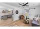 Bright, open-concept living area featuring modern furnishings and seamless flow to the kitchen at 411 Berkeley Dr, Moncks Corner, SC 29461