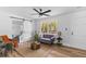 Cozy living room with a sliding barn door, neutral decor, and lots of natural light at 411 Berkeley Dr, Moncks Corner, SC 29461