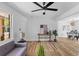 Inviting living room with hardwood floors, neutral decor, and ample natural light at 411 Berkeley Dr, Moncks Corner, SC 29461