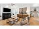Cozy living room featuring a fireplace, built-in bench, and comfortable seating at 416 Barbadian Way, Mount Pleasant, SC 29464