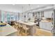 Stylish kitchen offers island seating, stainless appliances, and a seamless connection to the dining area at 4217 Meadowbrook Ct, North Charleston, SC 29420