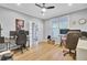 Well-lit office with ample desk space, featuring hardwood floors and modern fixtures for a productive work environment at 4217 Meadowbrook Ct, North Charleston, SC 29420