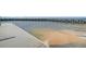 Scenic view of the boat ramp and dock area, perfect for boating enthusiasts and water adventures at 454 Pooshee Plantation Way, Bonneau, SC 29431