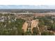 Aerial view of the property showcasing the large lot, water features and surrounding woods at 4689 Causey Pond Rd, Awendaw, SC 29429