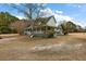 Charming home with a large yard and wraparound porch at 4689 Causey Pond Rd, Awendaw, SC 29429