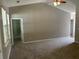 Spacious bedroom with neutral carpet, vaulted ceiling, and light-filled windows at 4804 Oak Haven Pl, Summerville, SC 29485