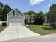 Charming two-story home with well-maintained landscaping and attached garage at 4804 Oak Haven Pl, Summerville, SC 29485