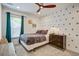Nicely decorated bedroom featuring a twin bed, dark dresser, and a window with blinds at 486 Maple Oak Ln, Charleston, SC 29414