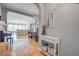 Inviting foyer with hardwood floors leading to an open living and dining area with ample natural light at 486 Maple Oak Ln, Charleston, SC 29414