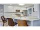 Bright kitchen featuring stainless steel appliances, marble countertops, and a breakfast bar with seating at 486 Maple Oak Ln, Charleston, SC 29414