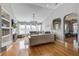 Bright and airy living room with vaulted ceilings, built-in shelving, and large windows at 486 Maple Oak Ln, Charleston, SC 29414