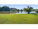 Picturesque pond view from a well-maintained lawn in the backyard at 486 Maple Oak Ln, Charleston, SC 29414