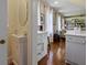 Elegant vanity, natural light, and hardwood floors enhance this stylish bathroom at 5 Logan St, Charleston, SC 29401