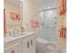 Well-lit bathroom featuring a modern vanity, sleek shower, and elegant fixtures at 5 Logan St, Charleston, SC 29401