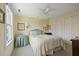Comfortable bedroom with natural light, plush carpet, and ample closet space at 5 Logan St, Charleston, SC 29401