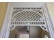 Elaborate decorative woodwork above the interior door frame at 5 Logan St, Charleston, SC 29401