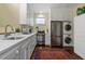 Modern kitchen featuring stainless steel appliances, and ample cabinet space at 5 Logan St, Charleston, SC 29401