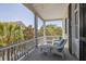 Charming porch featuring comfortable seating and scenic views of lush greenery at 5 Logan St, Charleston, SC 29401