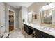 Large bathroom with double vanity, marble floors, and separate powder room at 504 Marsh Cove Cir, Summerville, SC 29486