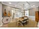 Open dining room with stylish accents and decor, next to a living space with natural light at 504 Marsh Cove Cir, Summerville, SC 29486