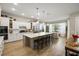 Bright kitchen features a large island with bar seating and stainless steel appliances at 504 Marsh Cove Cir, Summerville, SC 29486
