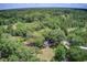 Lush acreage showcasing private home nestled amongst mature trees and greenery at 5126 Highway 174, Hollywood, SC 29449