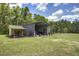 Large outbuilding perfect for storage, workshop, or other outdoor activities on the property at 5126 Highway 174, Hollywood, SC 29449