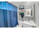 Bathroom featuring a blue shower curtain and grey walls at 516 Hope Plantation Ln, Jacksonboro, SC 29452