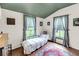 Bedroom with Hardwood Floors and view of yard at 516 Hope Plantation Ln, Jacksonboro, SC 29452