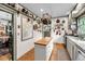 Spacious kitchen featuring an island with butcher block top and unique pot rack at 516 Hope Plantation Ln, Jacksonboro, SC 29452