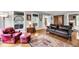 Cozy living room with hardwood floors, comfortable seating, and natural light at 516 Hope Plantation Ln, Jacksonboro, SC 29452