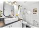 This modernized bathroom is complete with a vessel sink, marble countertops, and a glass-enclosed shower at 555 Pointe Of Oaks Rd, Summerville, SC 29485