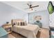 Bedroom with neutral colored bedding, carpet and furniture with a TV on the wall at 555 Pointe Of Oaks Rd, Summerville, SC 29485