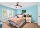 Bedroom with a ceiling fan, a TV, neutral bedding and carpeting at 555 Pointe Of Oaks Rd, Summerville, SC 29485