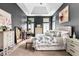 Spacious primary bedroom with high ceilings, neutral carpet, and plenty of natural light at 555 Pointe Of Oaks Rd, Summerville, SC 29485