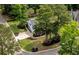 Lovely home surrounded by mature trees and professionally landscaped yard at 555 Pointe Of Oaks Rd, Summerville, SC 29485