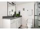 Modern bathroom featuring a gray countertop, white cabinetry, and a marble-tiled shower at 5814 Knight St, Hanahan, SC 29410