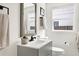 Bathroom featuring a gray vanity, a decorative mirror, and modern fixtures at 5814 Knight St, Hanahan, SC 29410