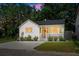 Charming home featuring a well-manicured lawn and inviting front porch, showcasing classic curb appeal at 5814 Knight St, Hanahan, SC 29410
